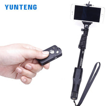 Load image into Gallery viewer, YUNTENG YT-0188 Extendable Handheld Tripod Monopod Adapter Self Held with Phone Clip &amp; Bluetooth Shutter
